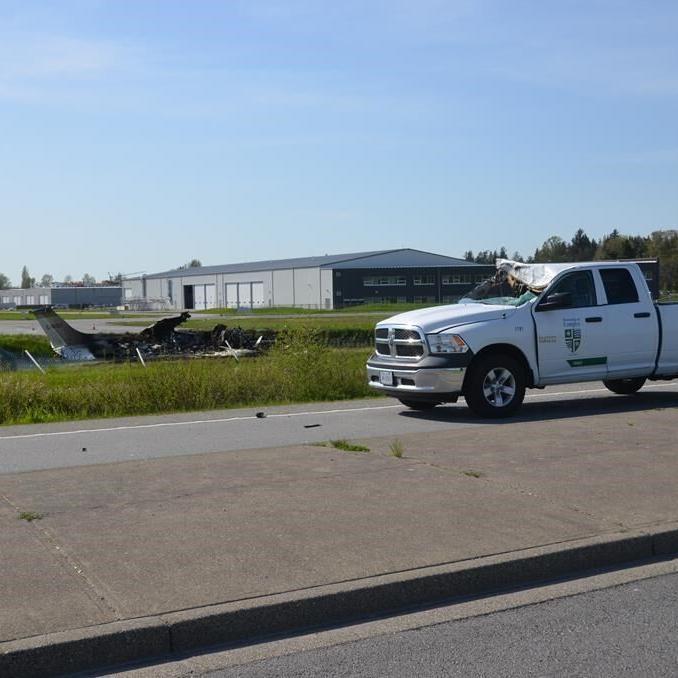 Three hurt after plane clips truck during landing, crashes at Langley, B.C., airport